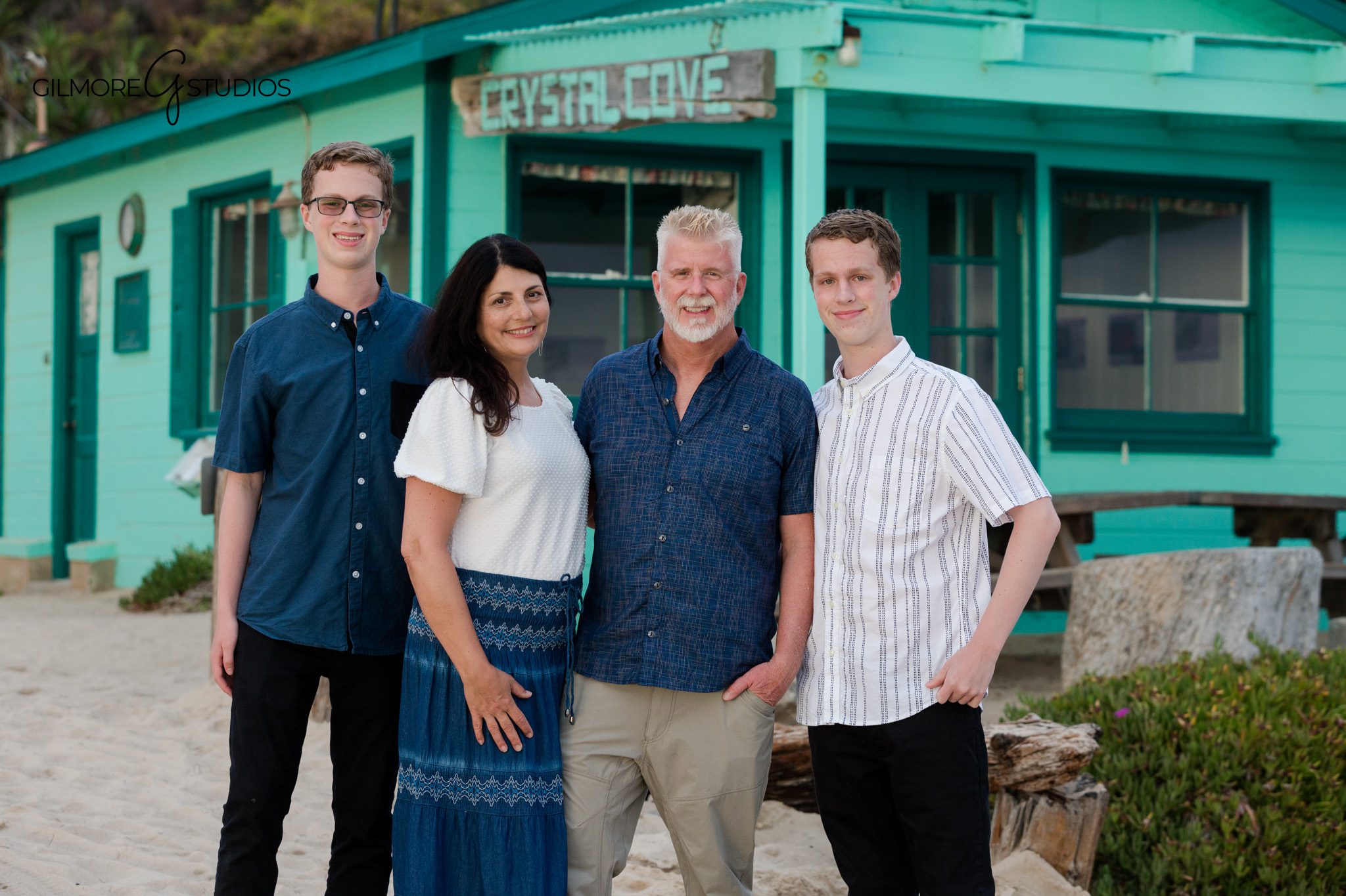 Family walking near the ocean during senior portrait session
Crystal Cove beach photos with family walking by the water