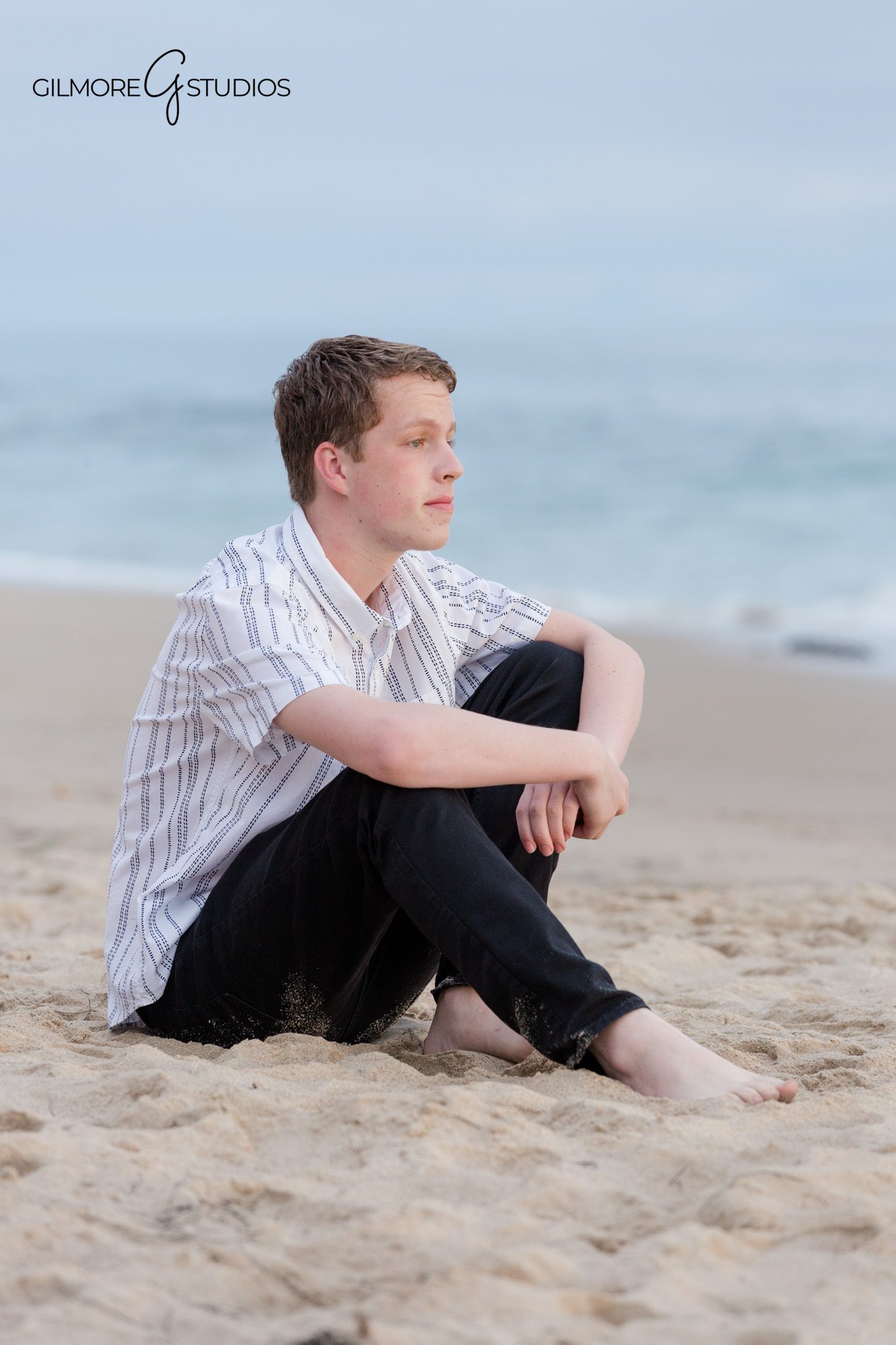 Mother and twin sons posing for senior photos at Crystal Cove
Mom with two senior boys during Newport Beach beach session