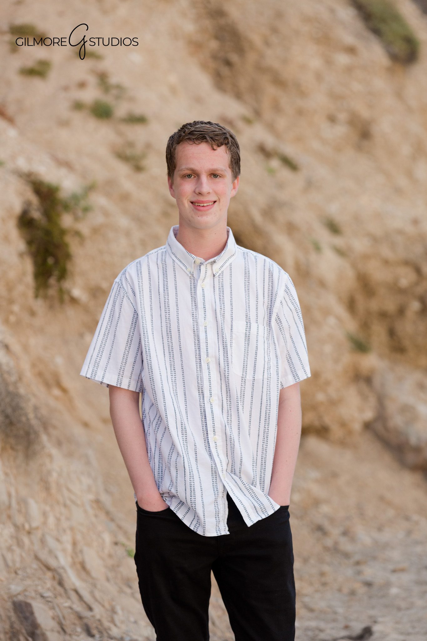 Two senior boys standing together on the sand at Crystal Cove
Newport Beach senior photos with twin brothers by the ocean