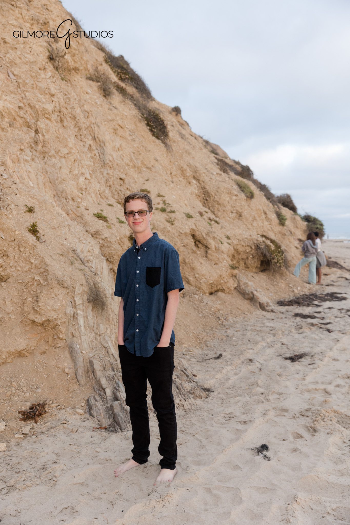 Crystal Cove senior portraits with soft coastal clouds and ocean waves
Twin senior session at Crystal Cove with relaxed beach posing