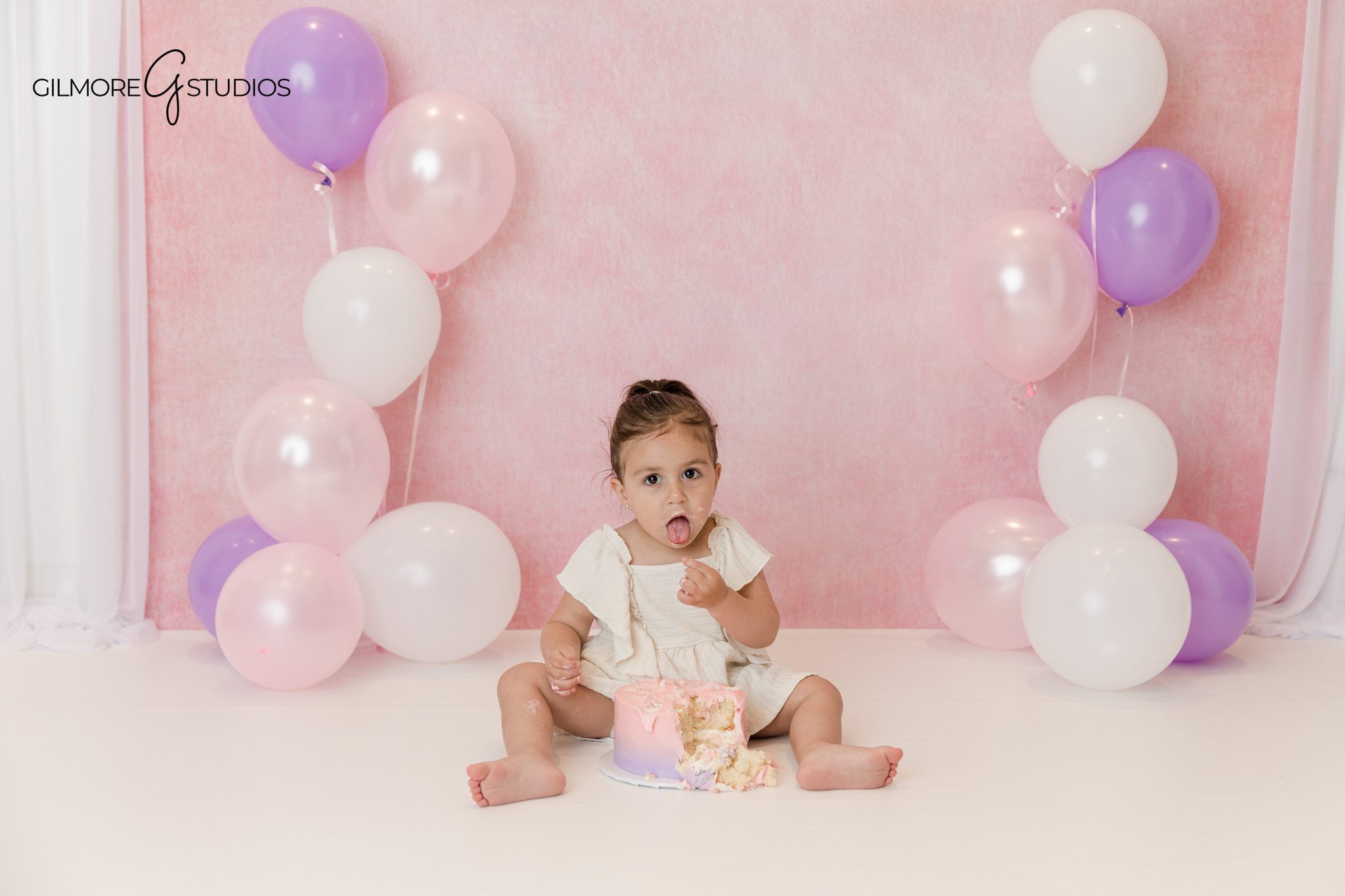 Family friendly cake smash session with mom and toddler in studio
Queen Creek birthday photographer capturing toddler and mom portraits