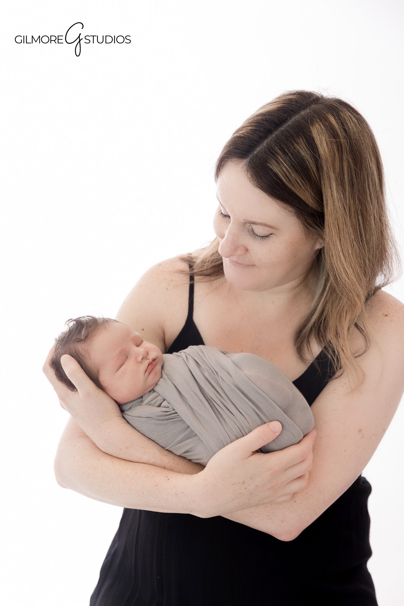 Newborn and sibling portrait for growing family in Arizona
Studio newborn photos with toddler sibling and wrapped baby