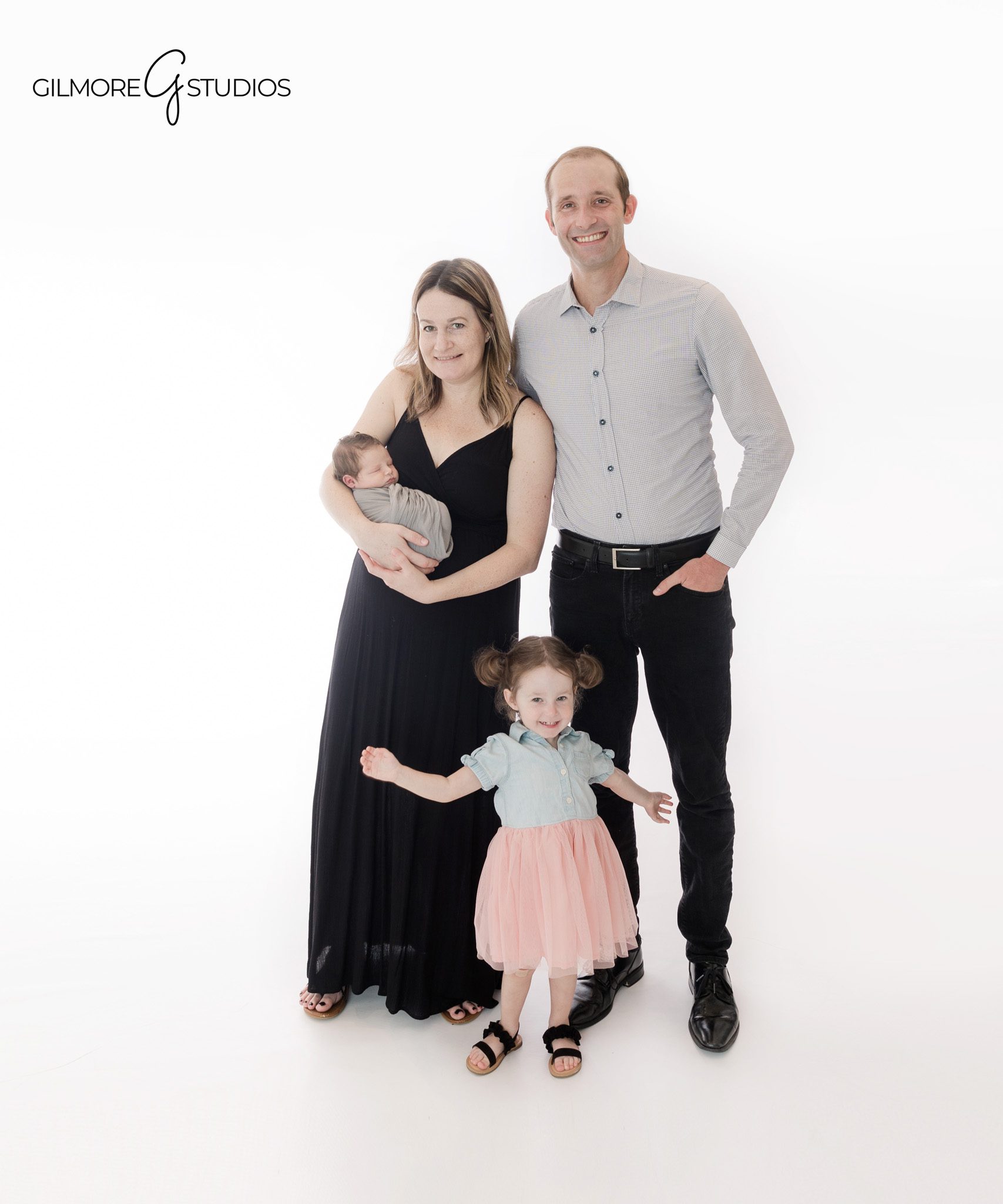 Studio sibling portrait with newborn baby and toddler sister
Growing family newborn photos with older sibling in Queen Creek