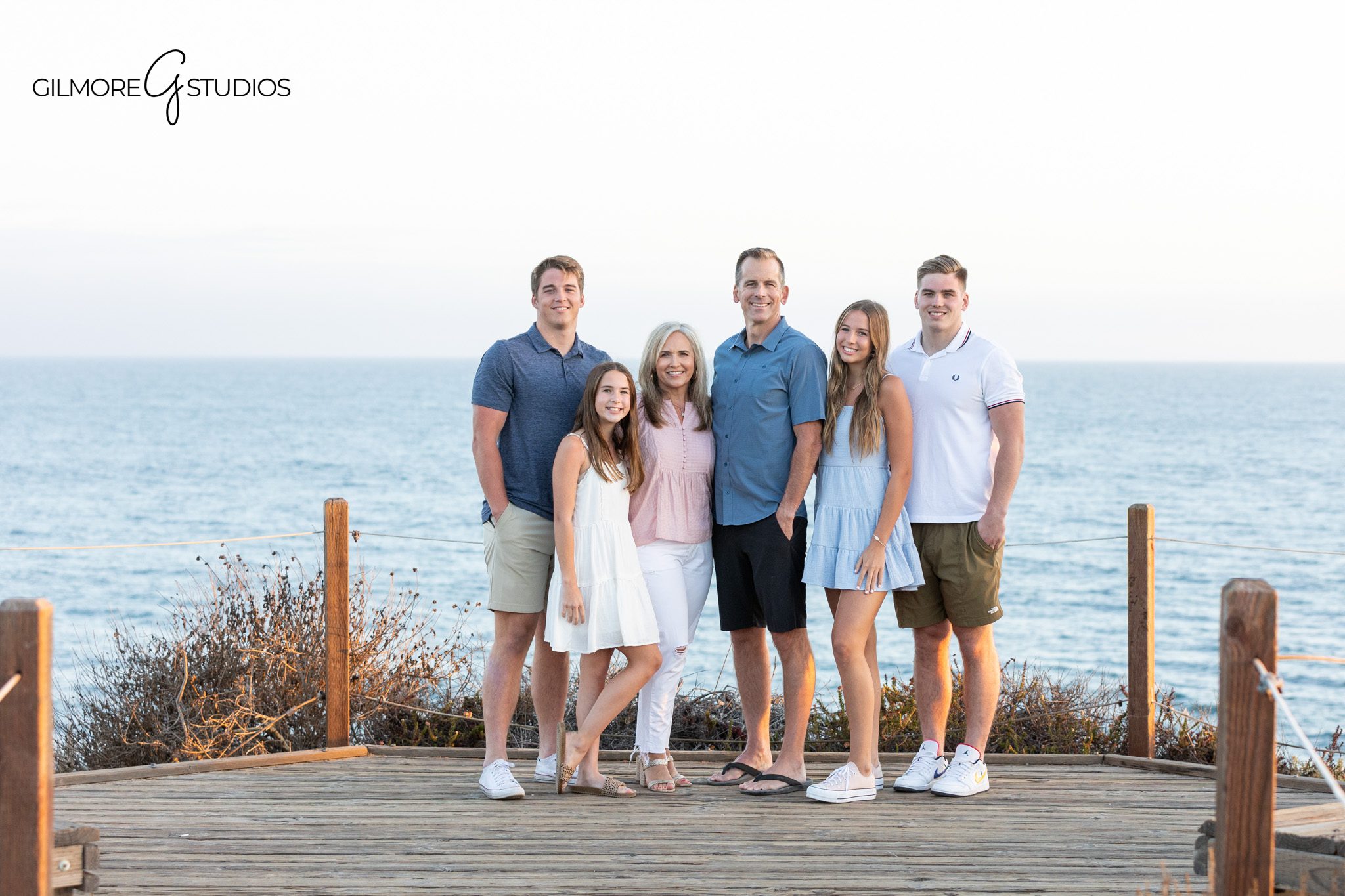 Multi generation family session with ocean view in Newport Beach
Grandkids and grandmother portrait during golden hour family photos