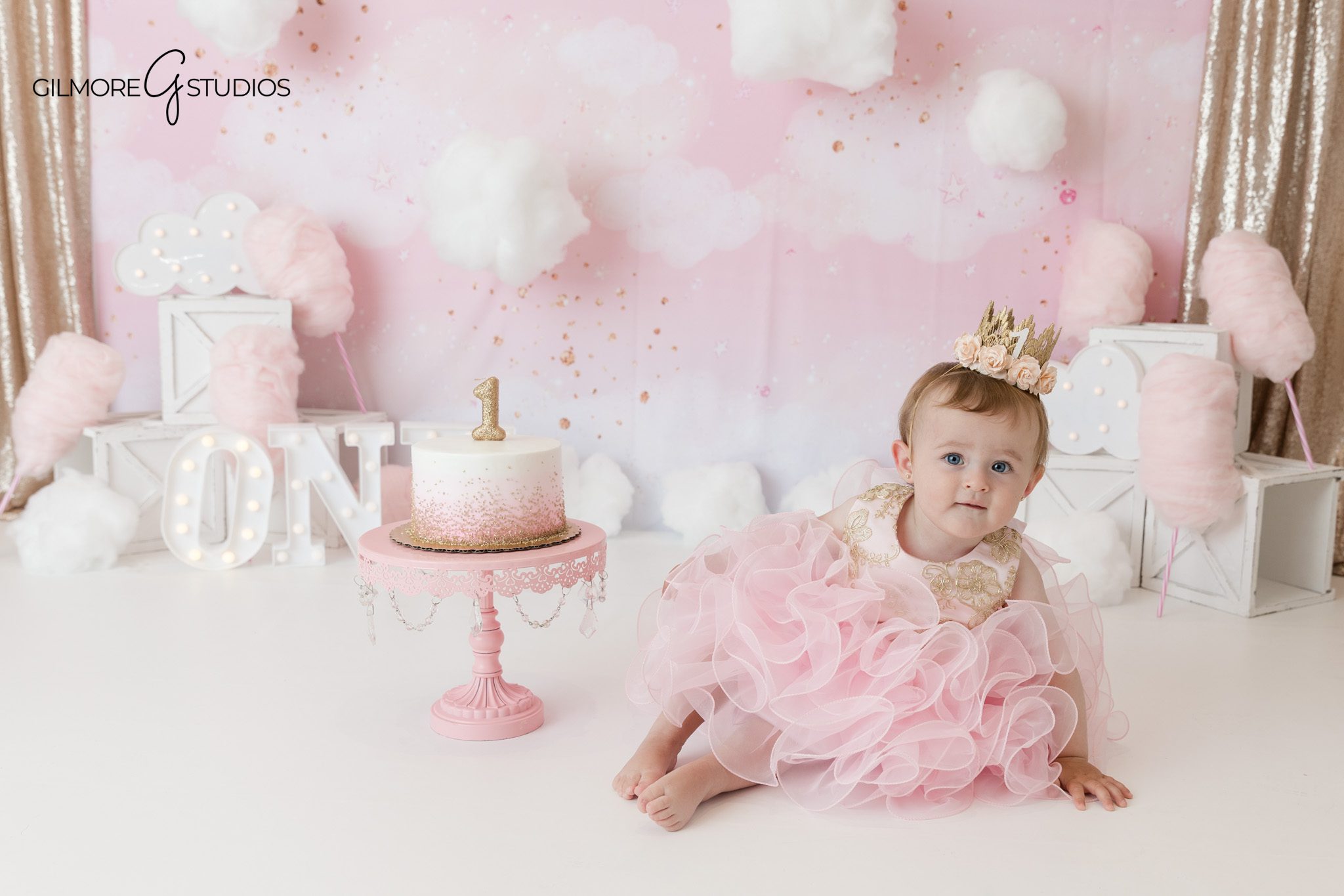 Baby girl reaching for cake during first birthday photos
Newport Beach baby photographer capturing first birthday milestone