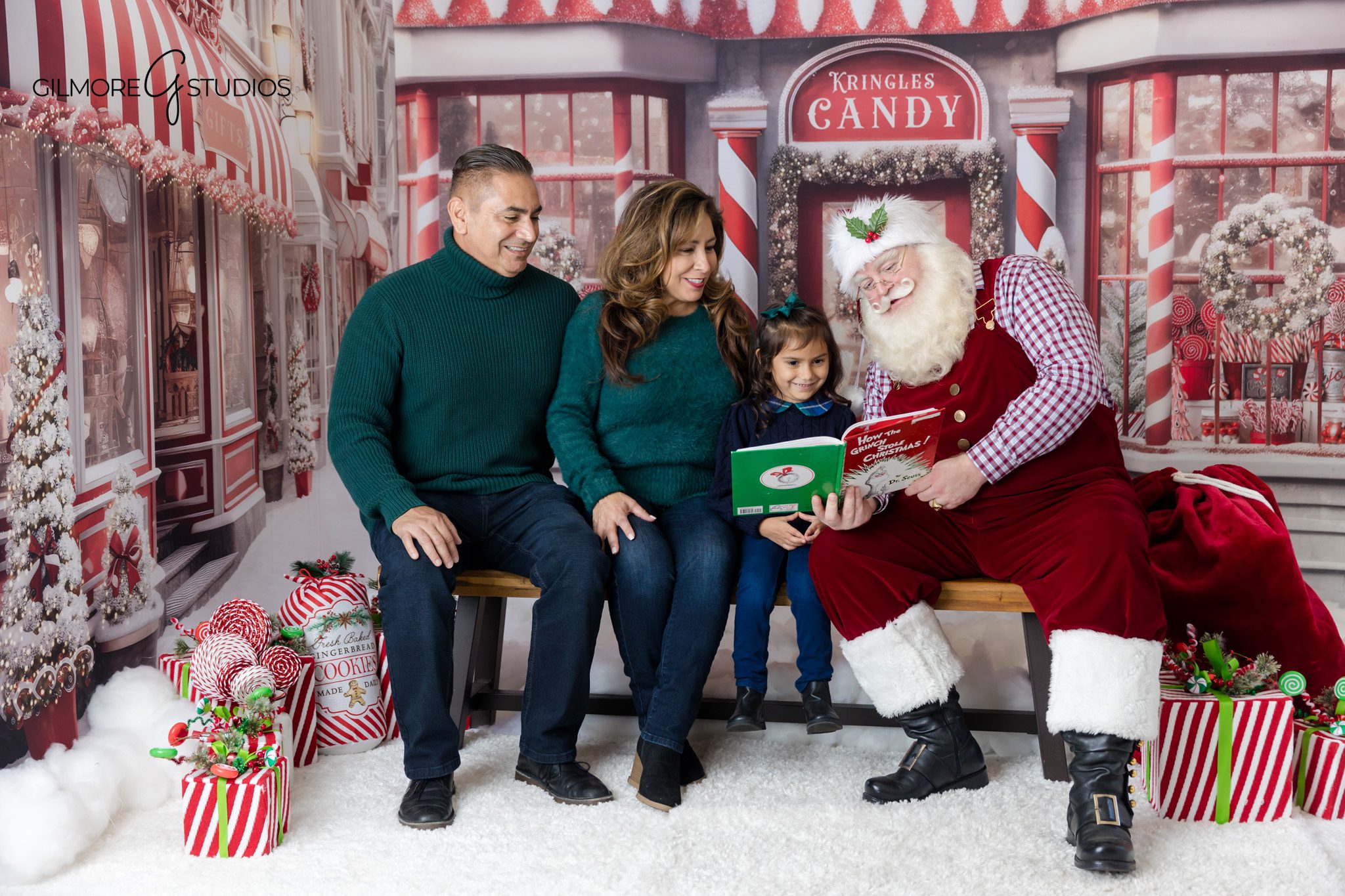 Santa reading a Christmas story during Queen Creek holiday photo session
Family Santa photos near Queen Creek AZ with cozy Christmas backdrop
