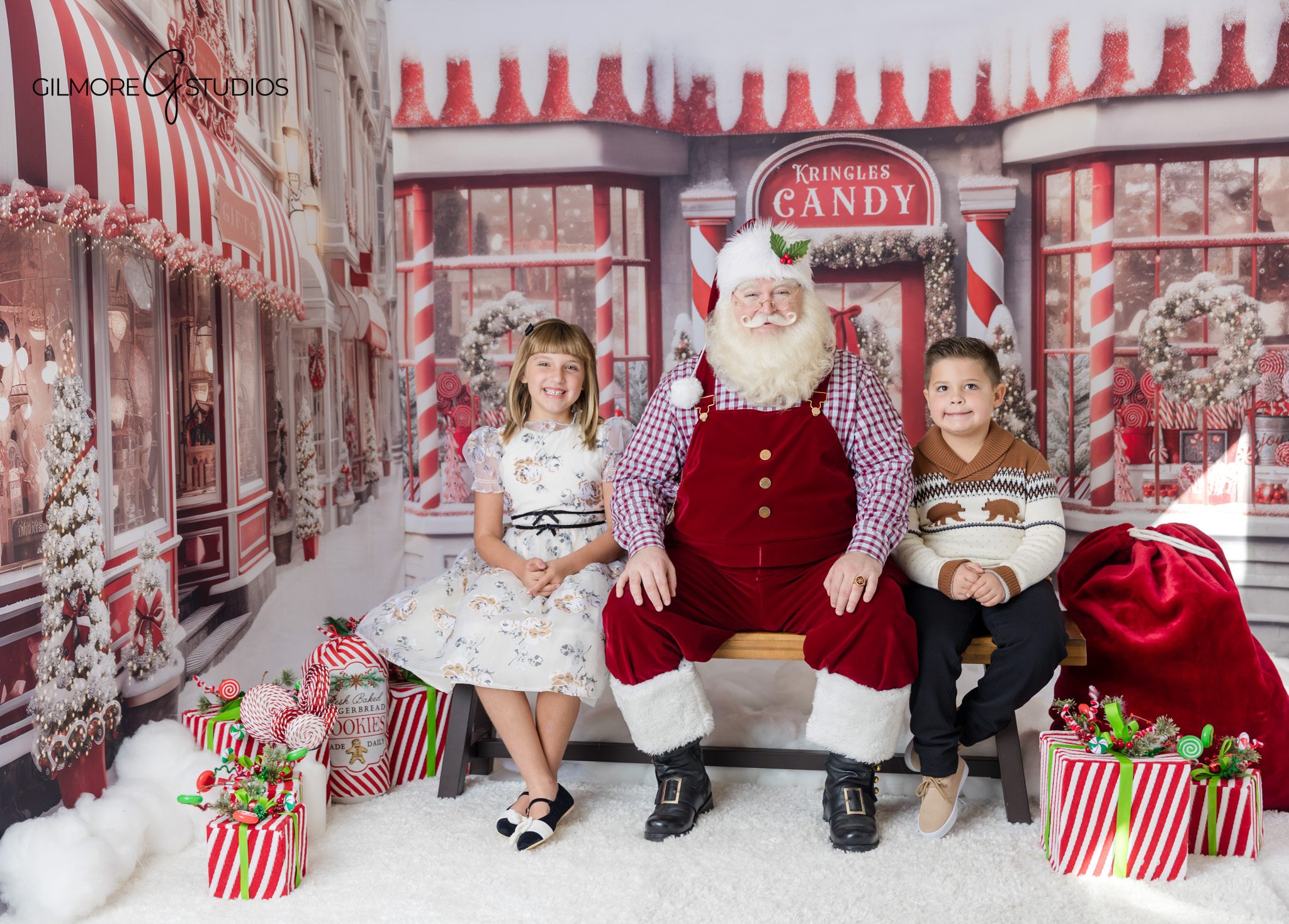 Queen Creek Christmas photos with Santa and styled candy shop set
Child smiling with Santa during holiday mini session in Queen Creek