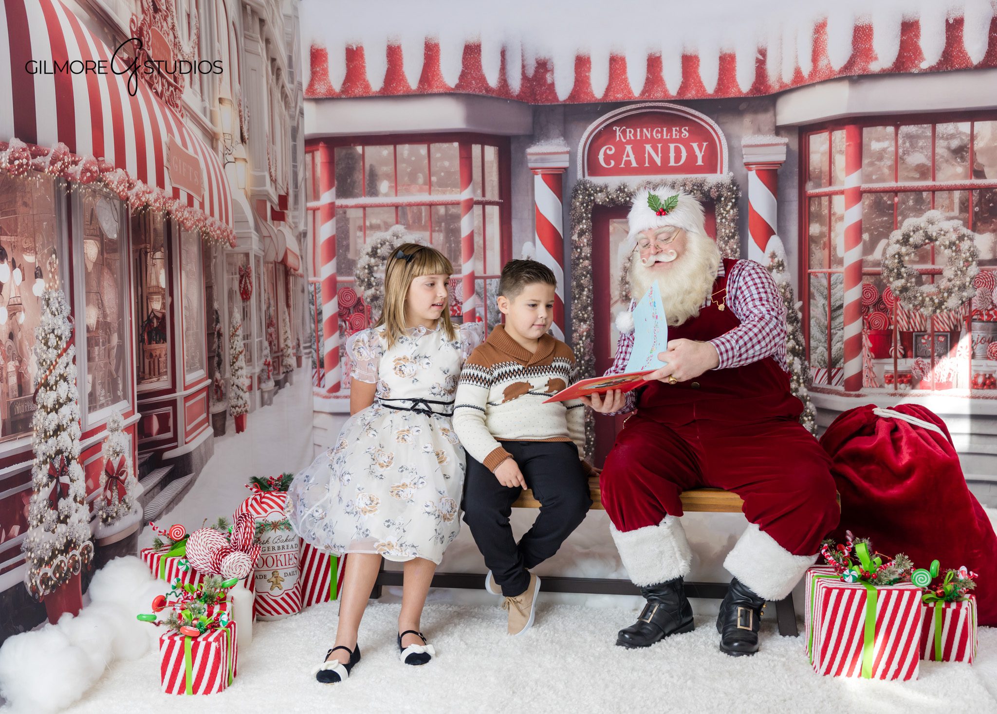 Santa photos in Arizona with festive candy shop Christmas set
Queen Creek family photographer capturing Santa mini sessions