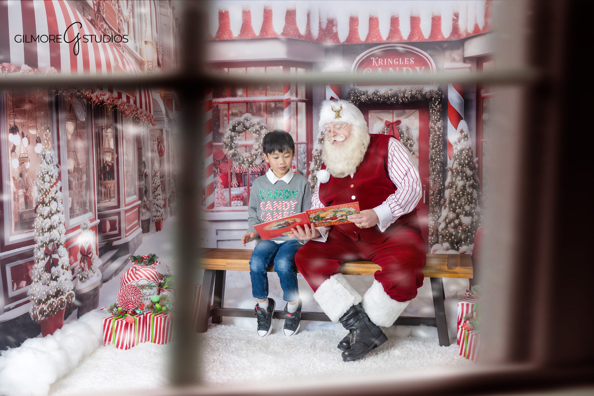 Santa photo session with young girl in red and white Christmas outfit
Gilbert AZ Santa mini session with child standing beside Santa
