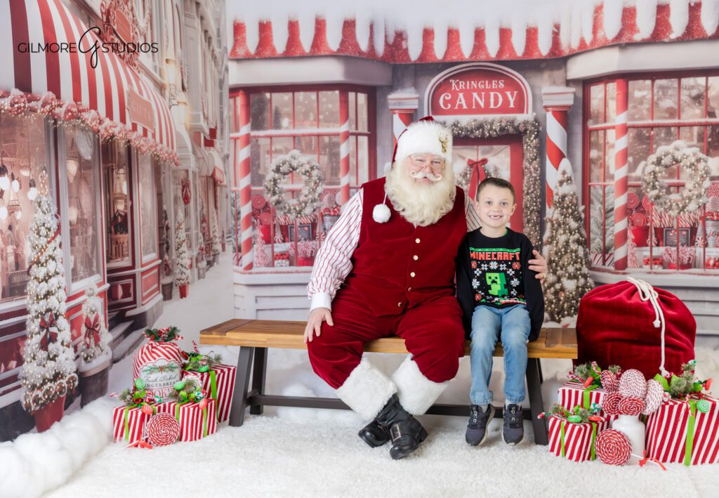Gilmore Studios Santa photos with boys and classic red holiday backdrop
Queen Creek AZ Santa mini session with siblings and Santa