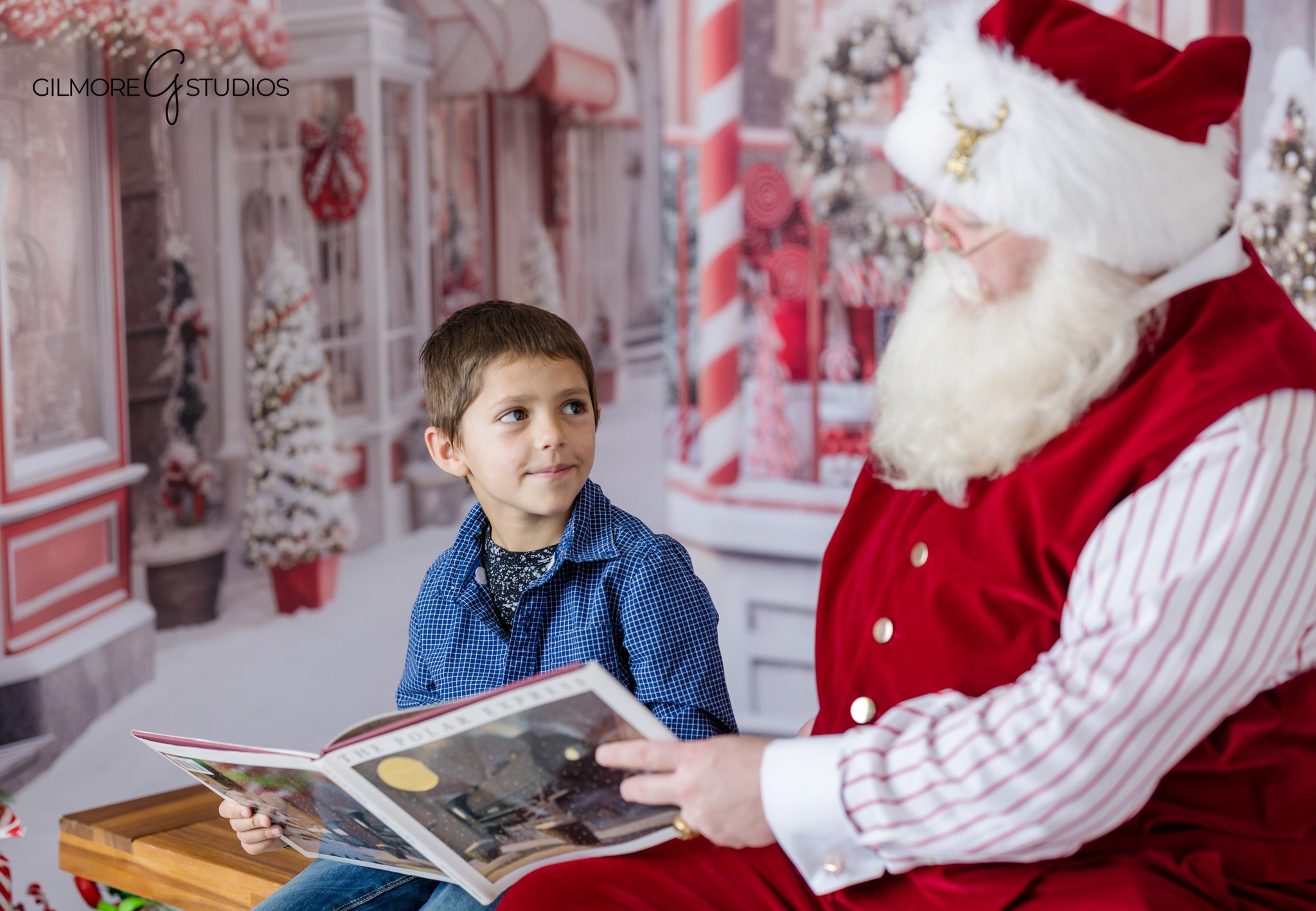 Santa reading with child during East Valley Christmas photos
Gilbert AZ Christmas photos with Santa through window frame