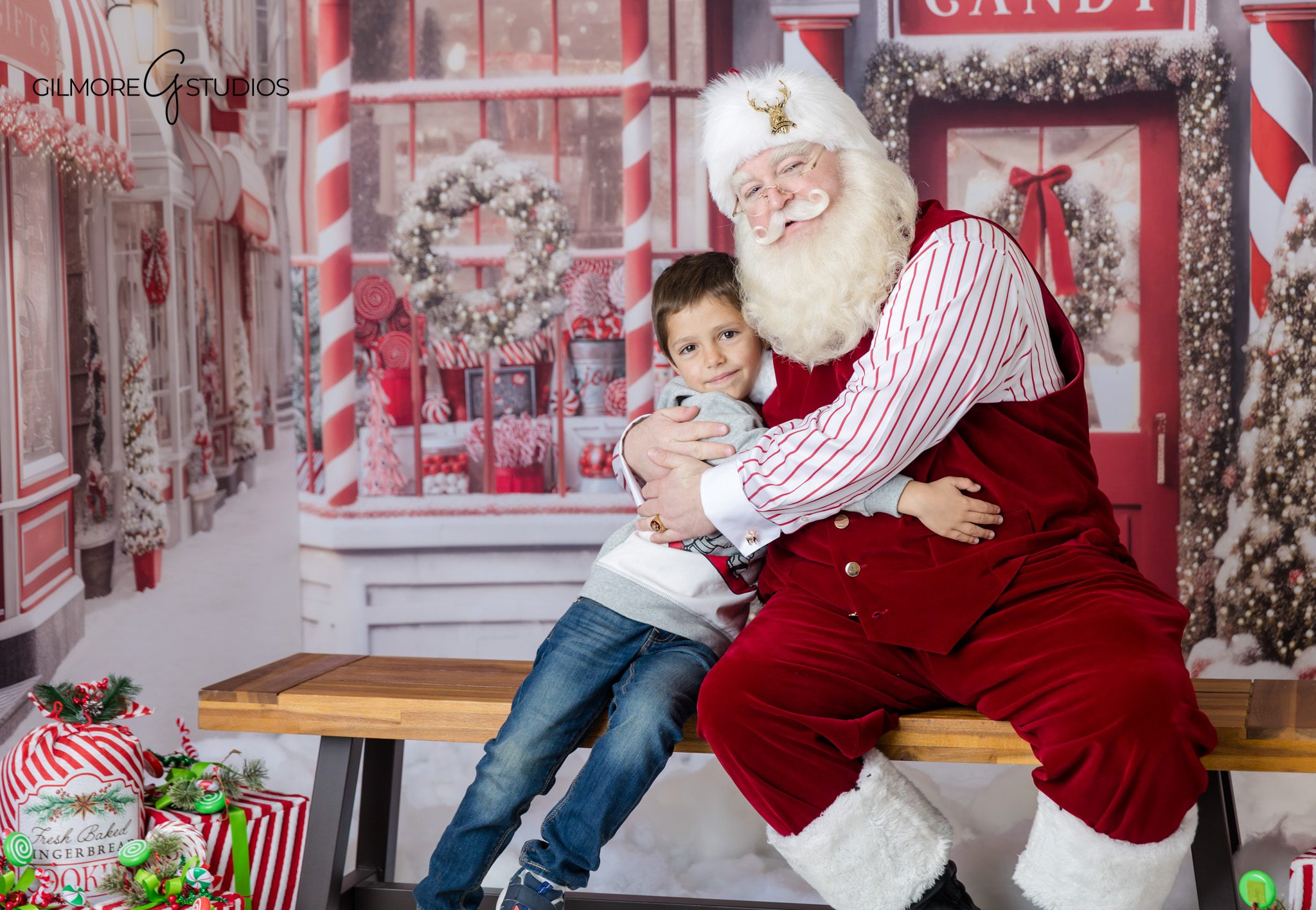 Santa listening to child during professional Christmas photos
Sweet Santa photos near Gilbert with little girl in holiday dress