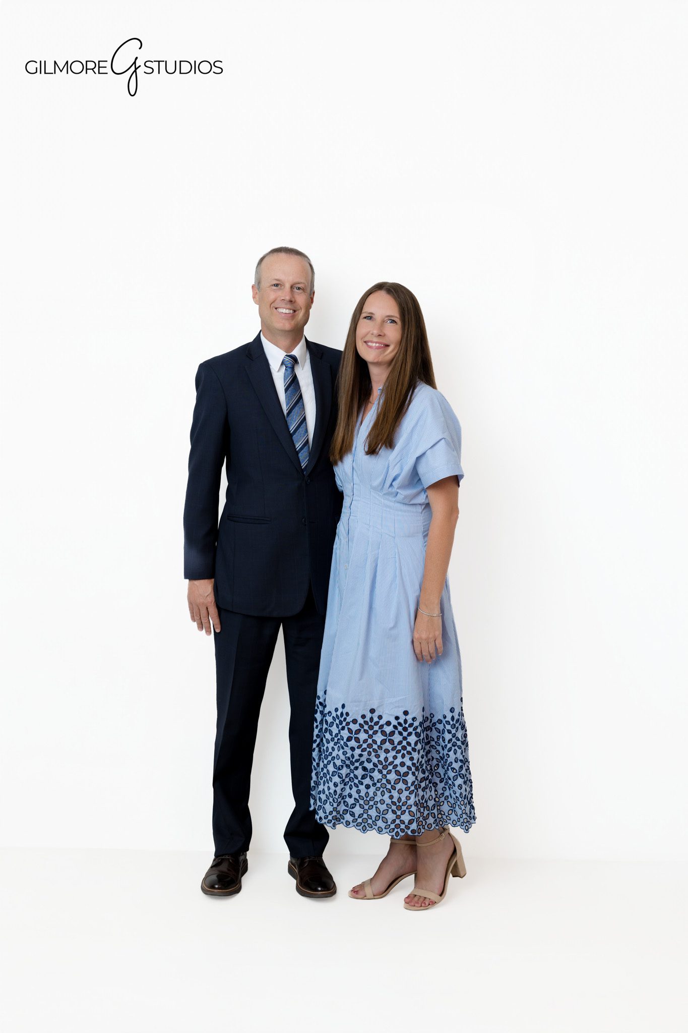 Family portrait session with a clean white backdrop in Queen Creek Arizona
Gilmore Studios family photo session for older kids and parents