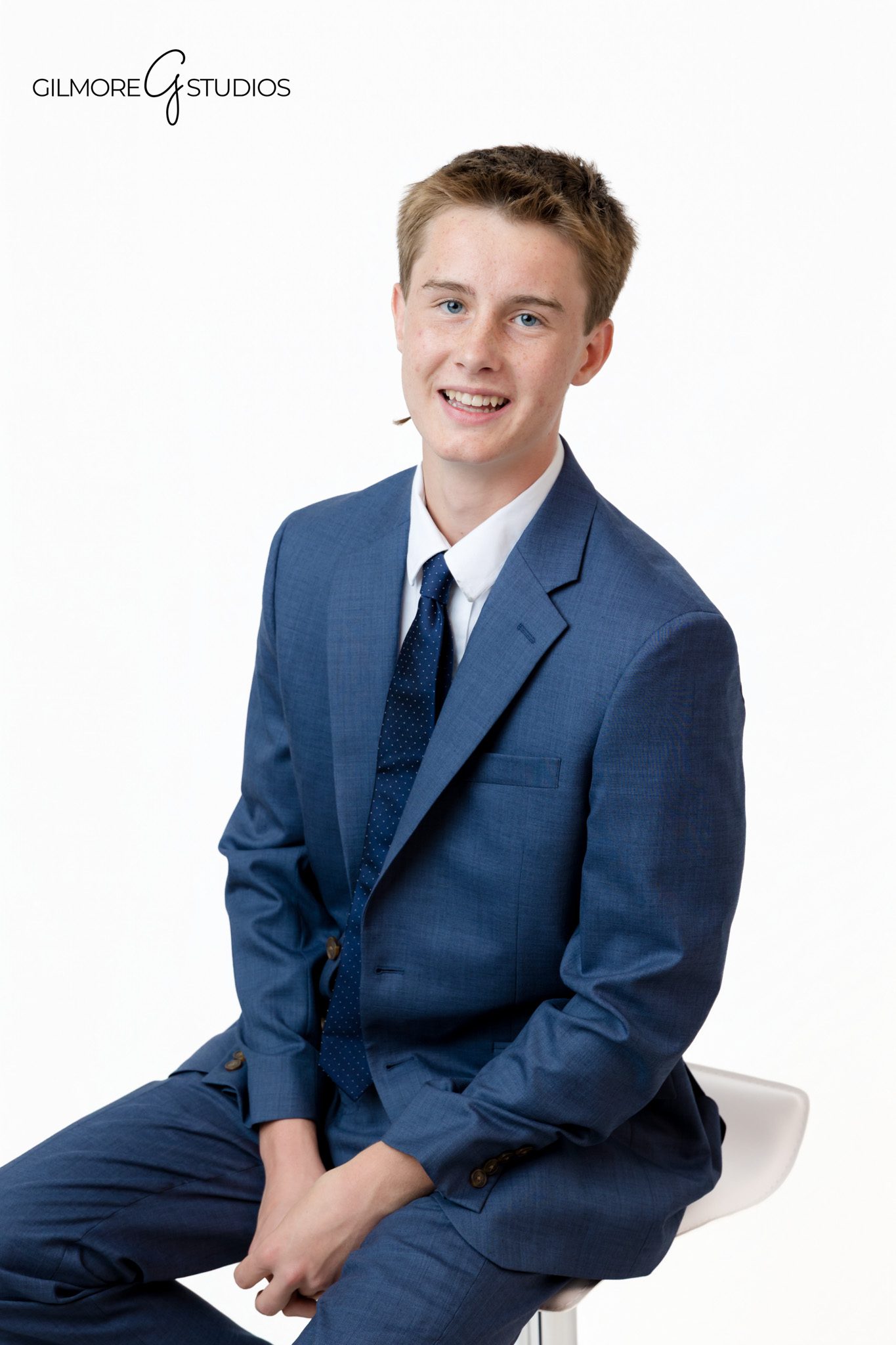 Timeless family photography in Queen Creek Arizona by Gilmore Studios
Polished family photo session with older boys in suits and ties