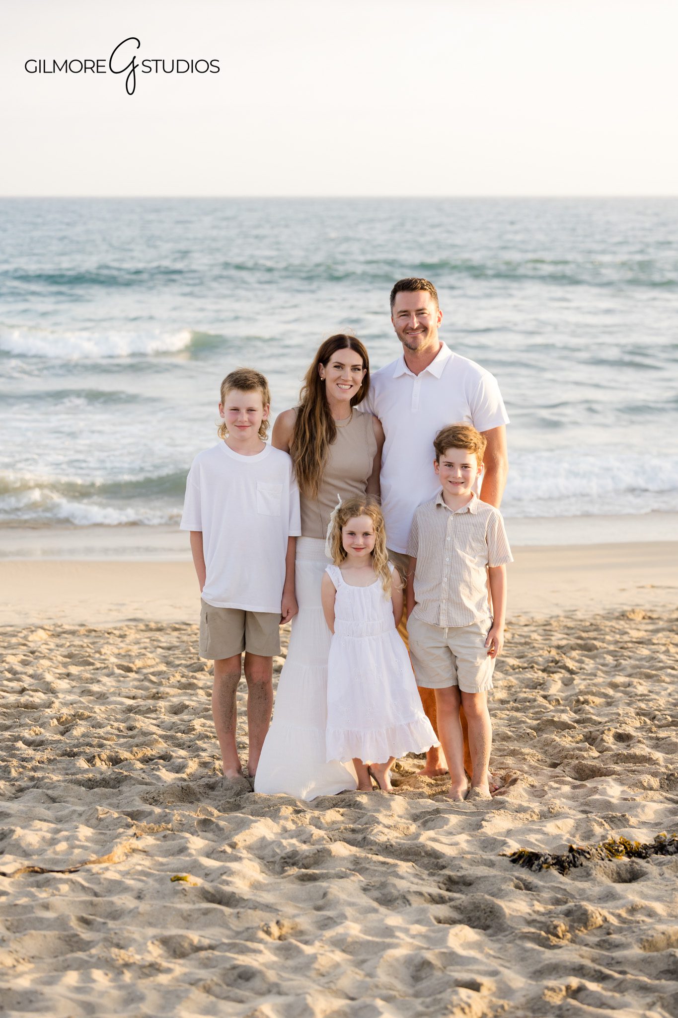 Newport Beach vacation photos for families visiting Southern California
Extended family photographer capturing grandparents and cousins at the beach