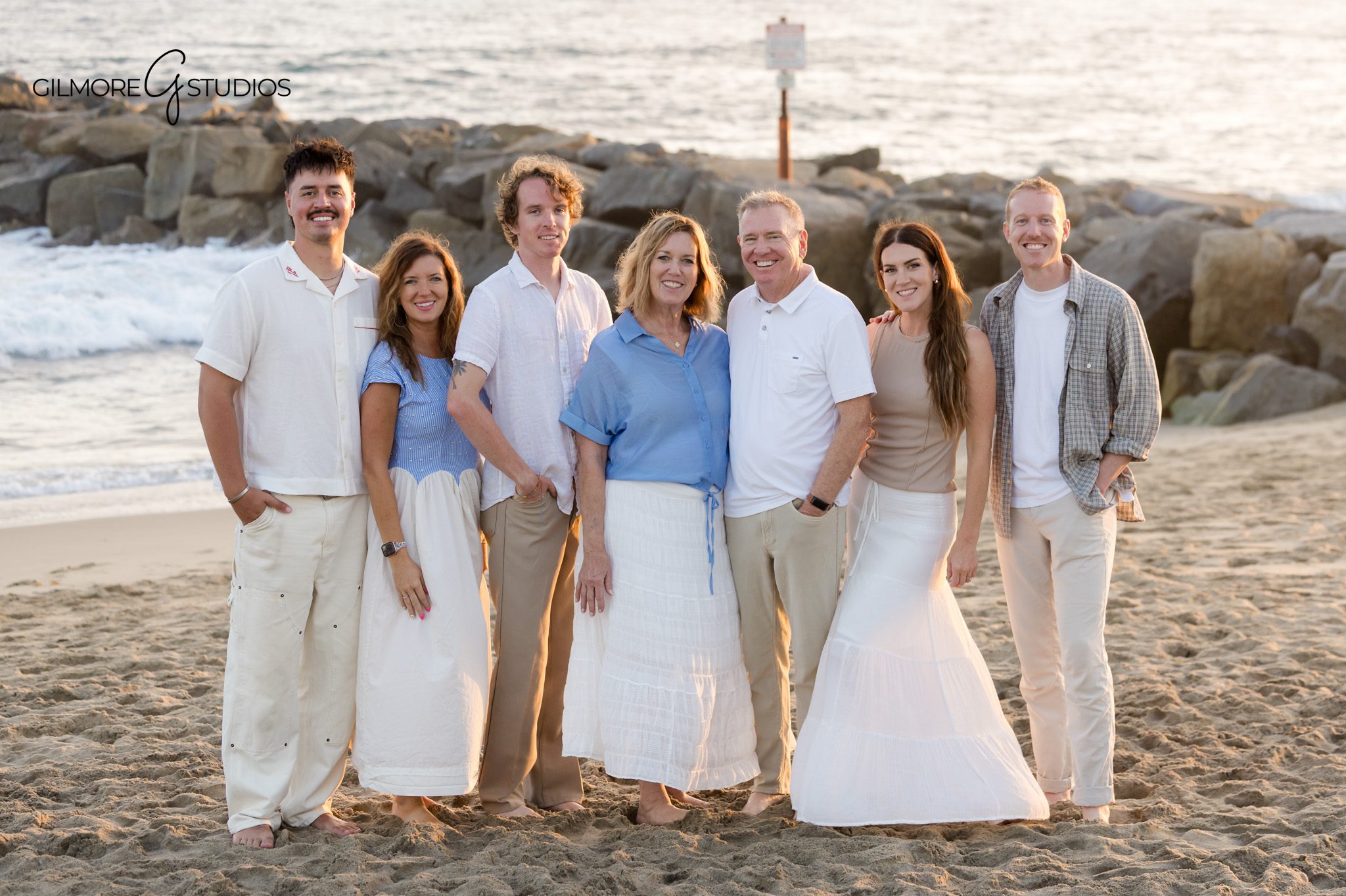 Family reunion beach photos during Newport Beach vacation
Extended family beach session with soft sunset light in Newport Beach
