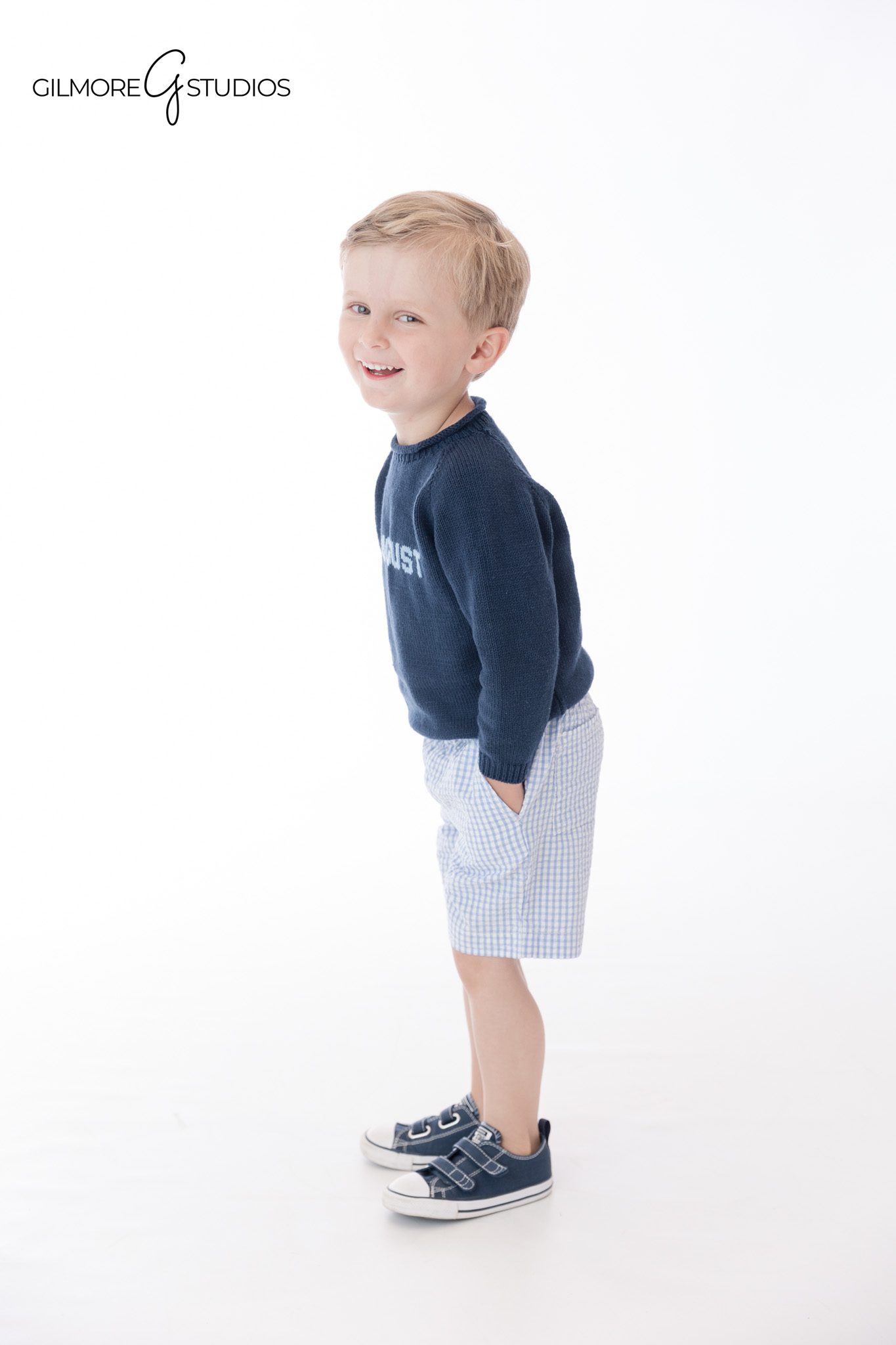 Gilbert AZ family and personality portrait session
Parents and young child smiling during white studio portraits