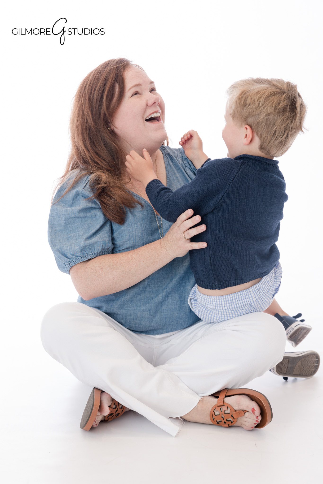Gilbert AZ studio portrait with simple modern chair
Classic children’s portrait with white background and natural smile