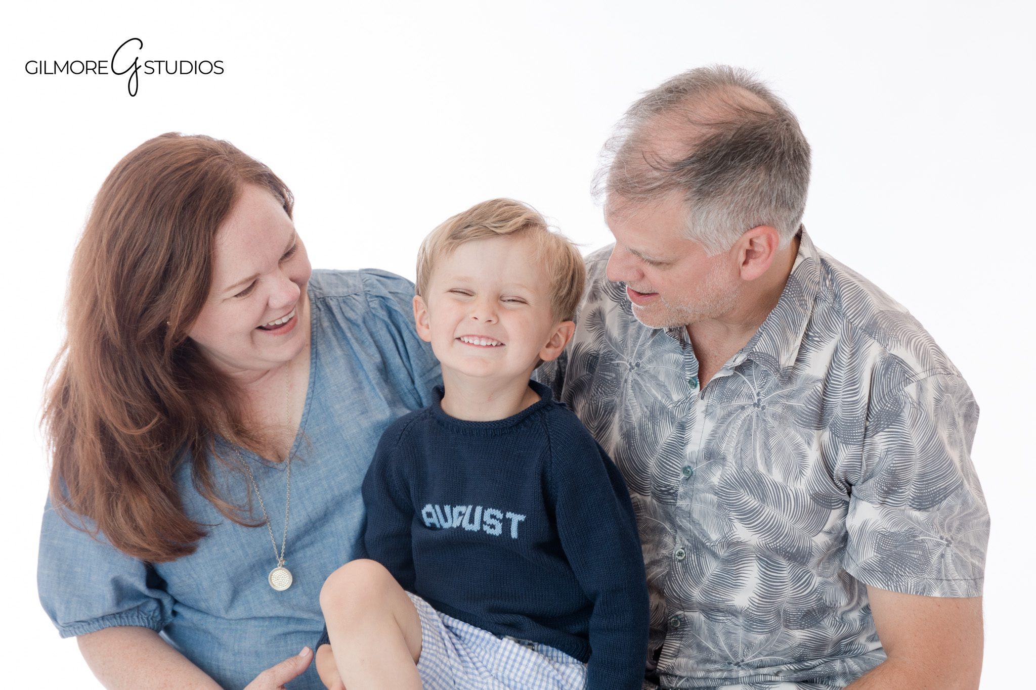 Gilbert AZ personality portraits on a white background
Child personality portrait session with simple white studio backdrop