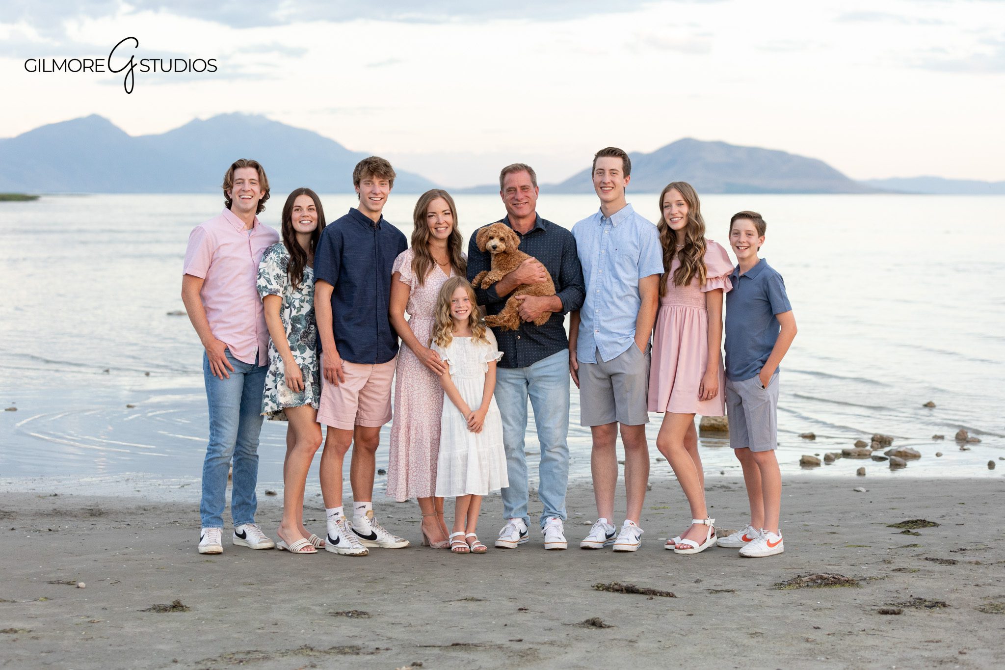 Just Ingredients family session photographed in Utah
Large family standing together for lakeside portraits in Utah