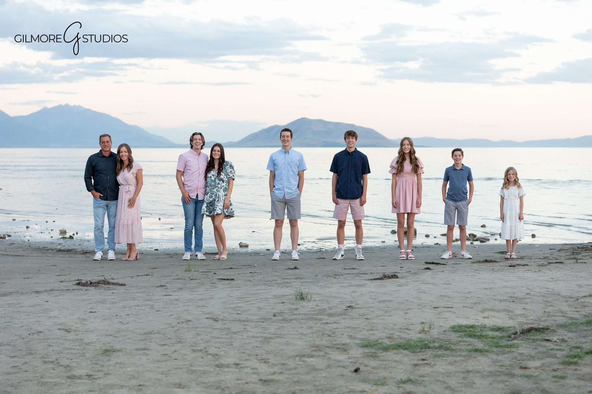 Family dog held during large family portrait by the water
Utah family photographer capturing family and dog near the lake