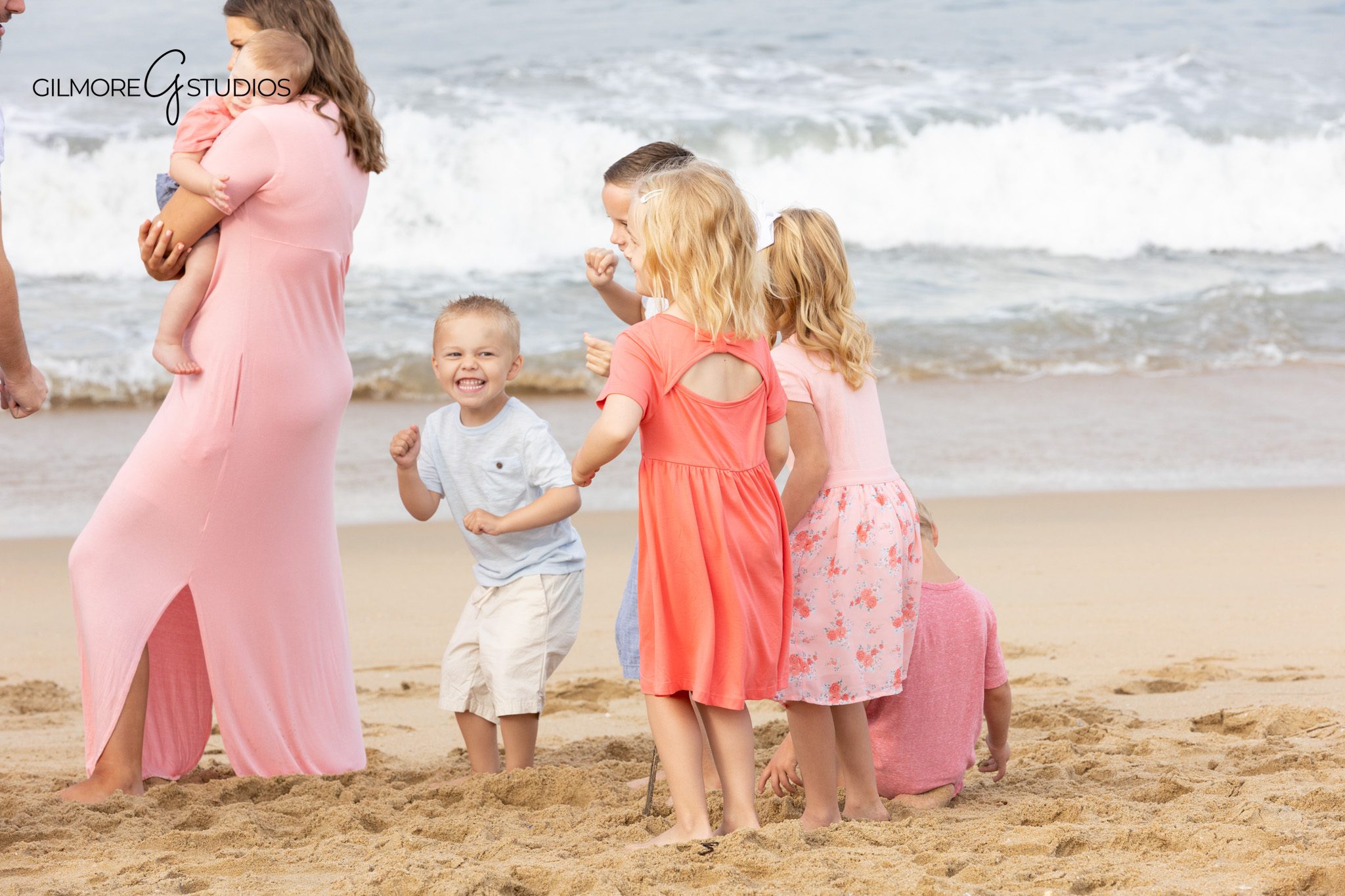 Extended family posing together by the water in Newport Beach
Newport Beach Pier family photographer for coastal portraits