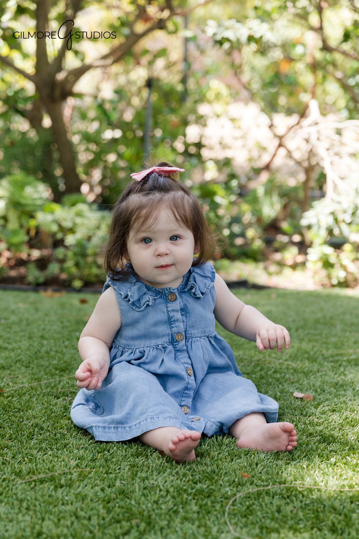 Baby girl in floral swimsuit for beach birthday photos
Tropical cake smash outfit for one year old baby girl