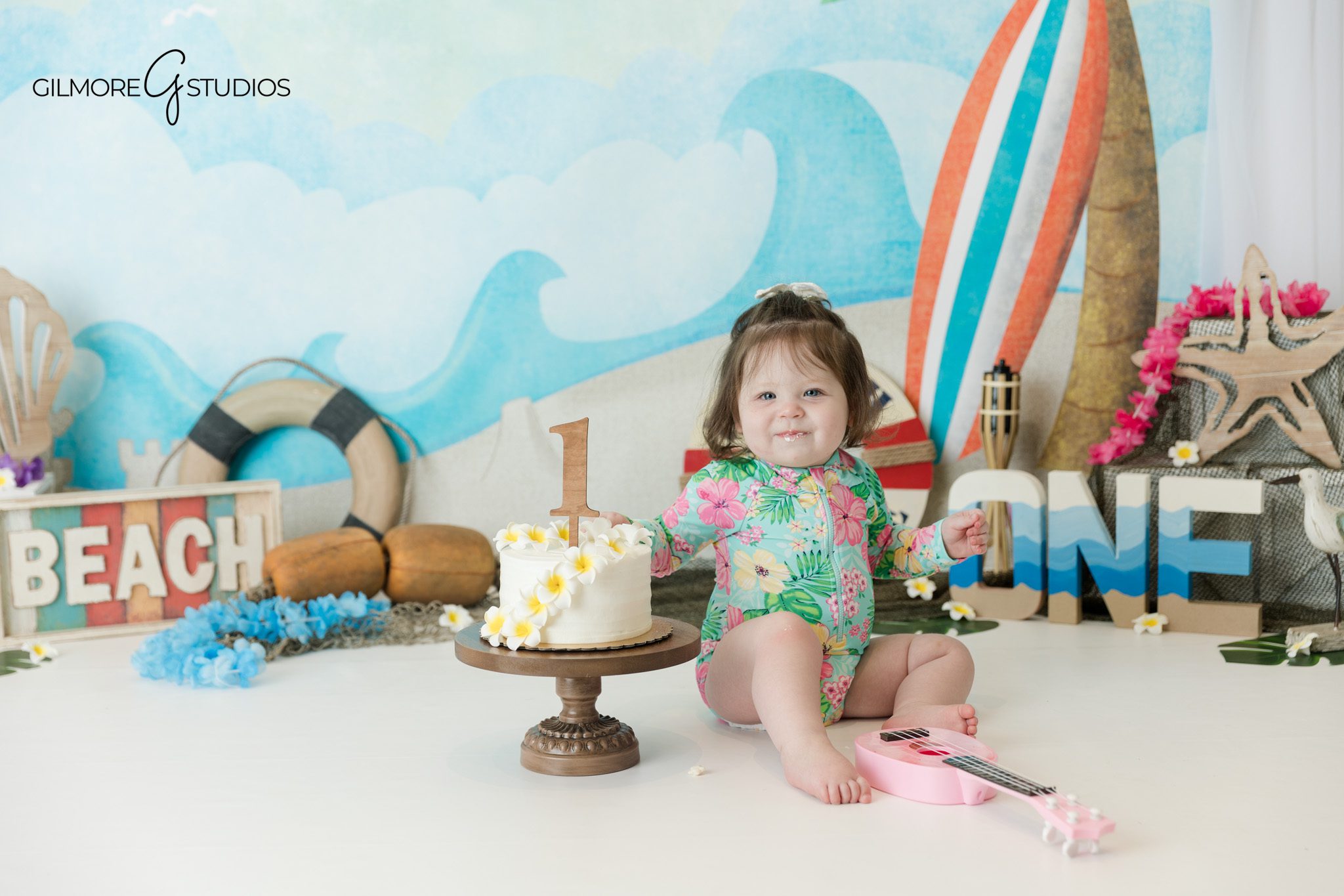 Queen Creek AZ cake smash photographer with beach theme birthday setup
Beach themed first birthday cake smash in Queen Creek Arizona
