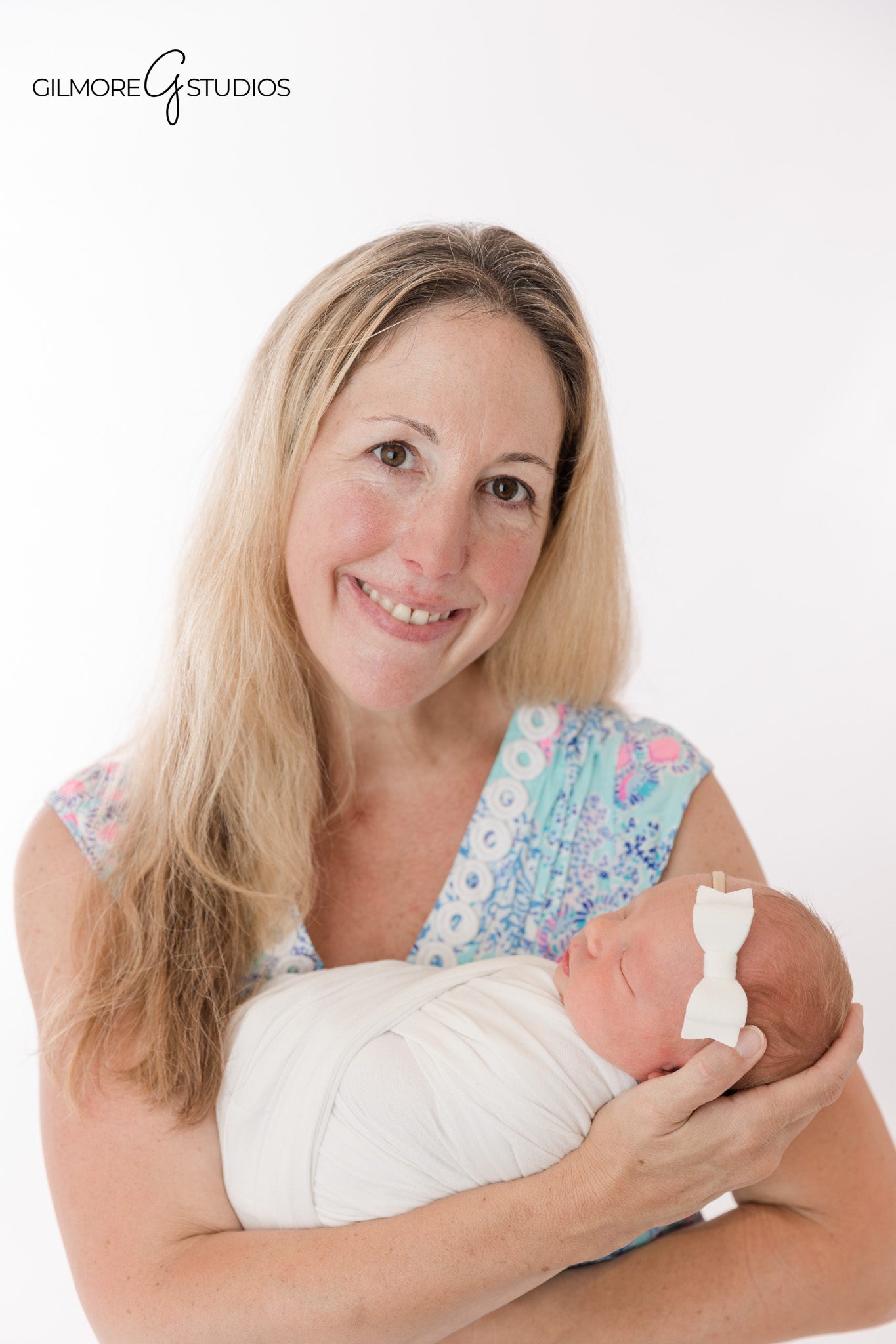 Newborn baby surrounded by vintage airplane decorations
Queen Creek newborn photographer with custom airplane setup