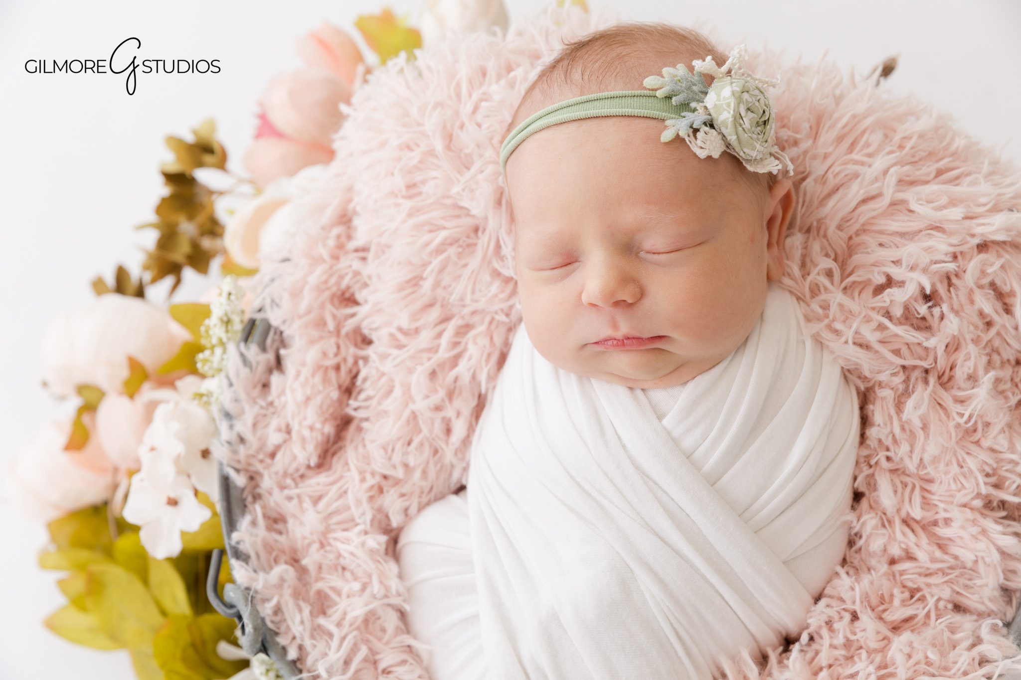 Studio newborn portrait with parents holding baby girl
Newborn family photos in Queen Creek AZ studio