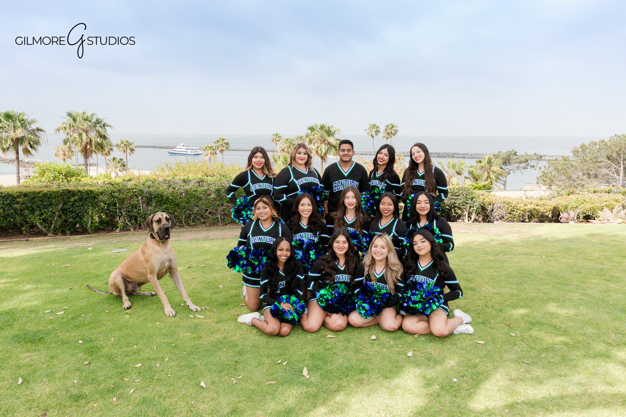Century High School cheer portraits with coastal scenery
Cheer team group photo with black uniforms and school colors
