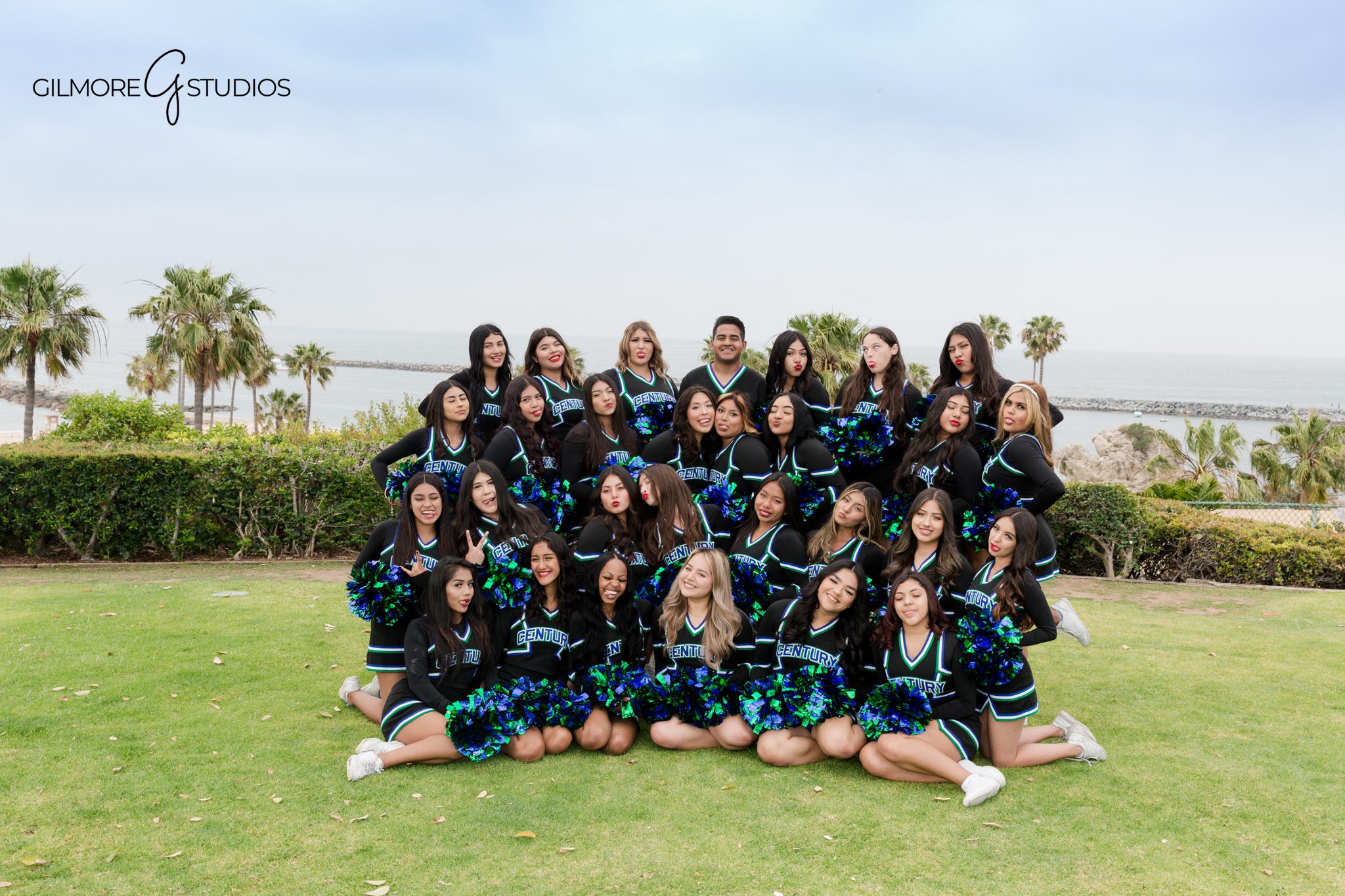Newport Beach cheer photographer for high school team portraits
Cheer squad laughing together during a fun team photo session