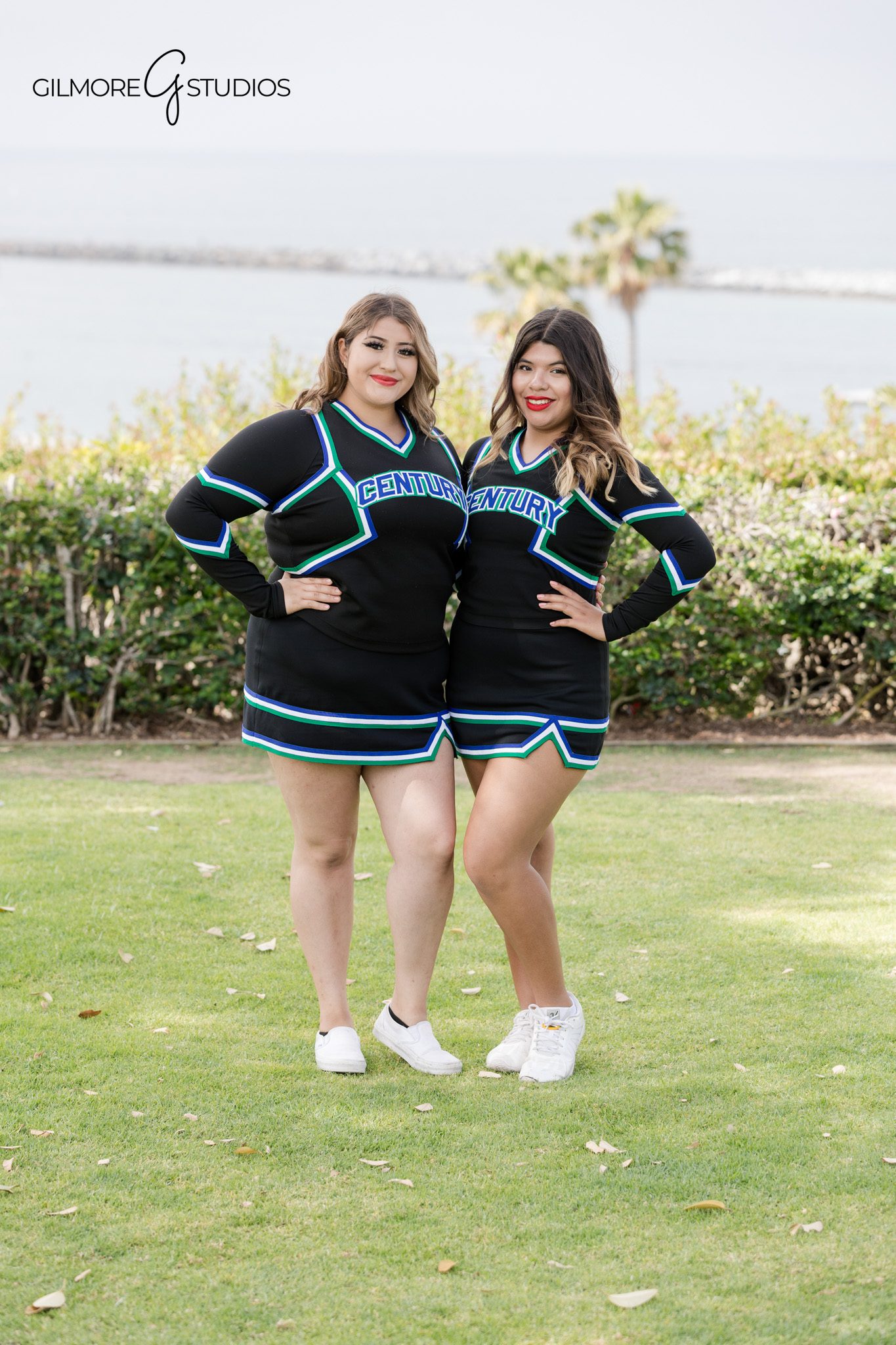 Cheer squad sitting together in uniform for team photos
Newport Beach team photographer capturing cheer portraits