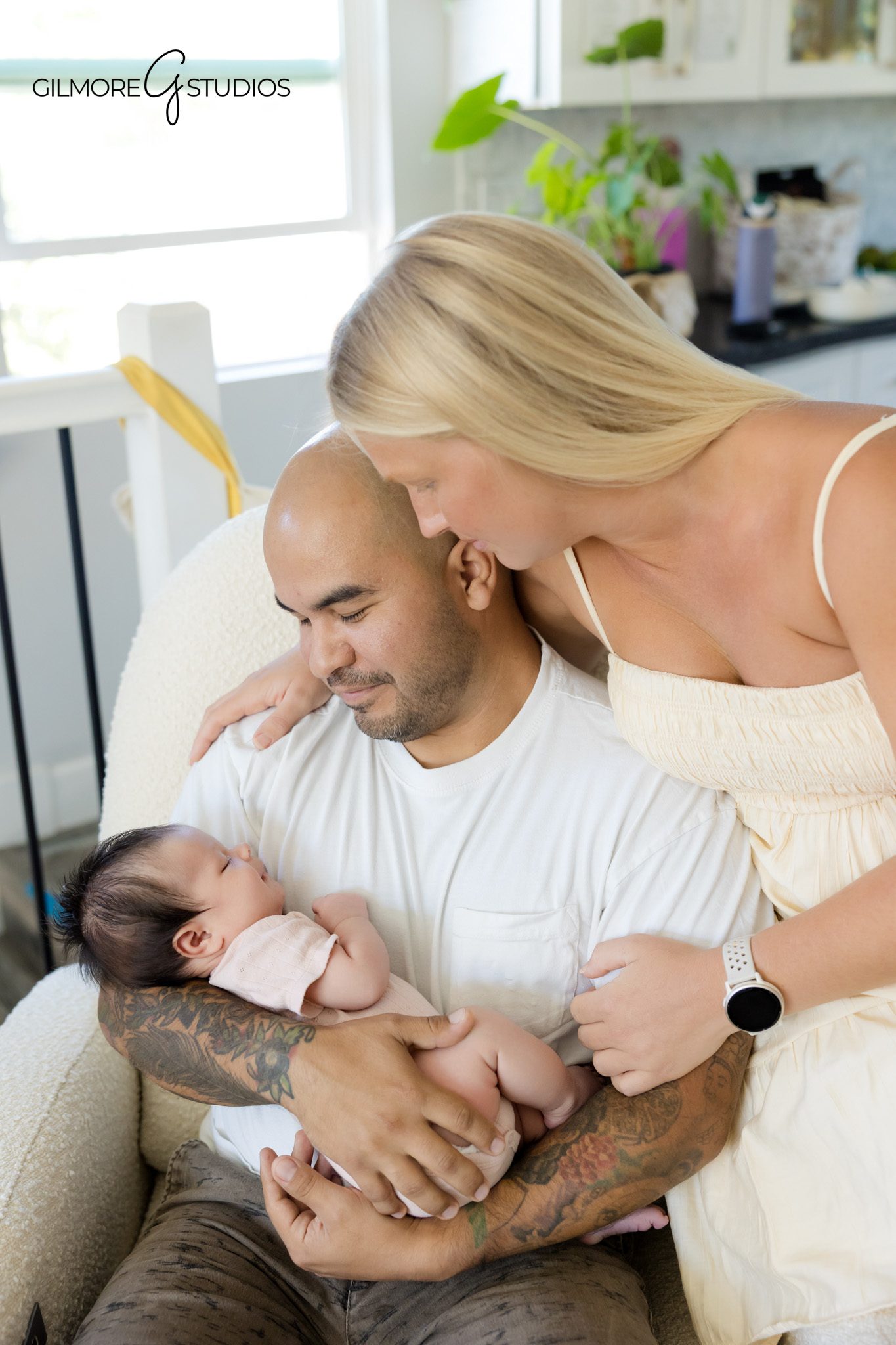 Queen Creek newborn photographer capturing baby details and nursery moments
Baby girl resting on cream blanket during newborn lifestyle photos