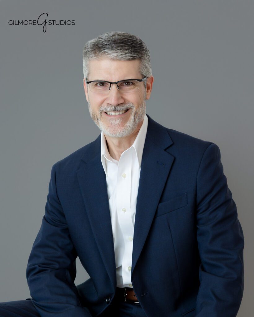 Professional LinkedIn headshot photographed in Queen Creek AZ
Individual executive headshot with clean gray background
