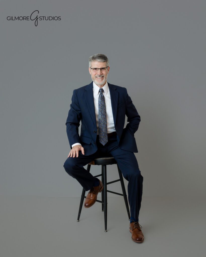 Queen Creek headshot session for business professional in navy suit
Studio headshot with navy suit and white dress shirt