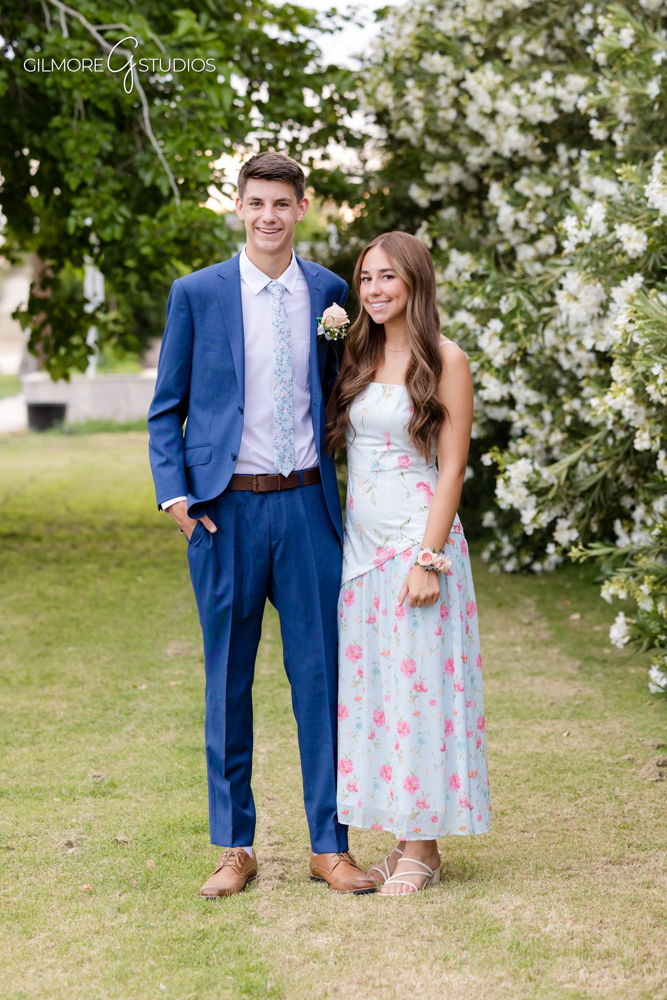 ALA prom girl in floral dress with date in black suit
Gilbert prom portrait with colorful dress and suit