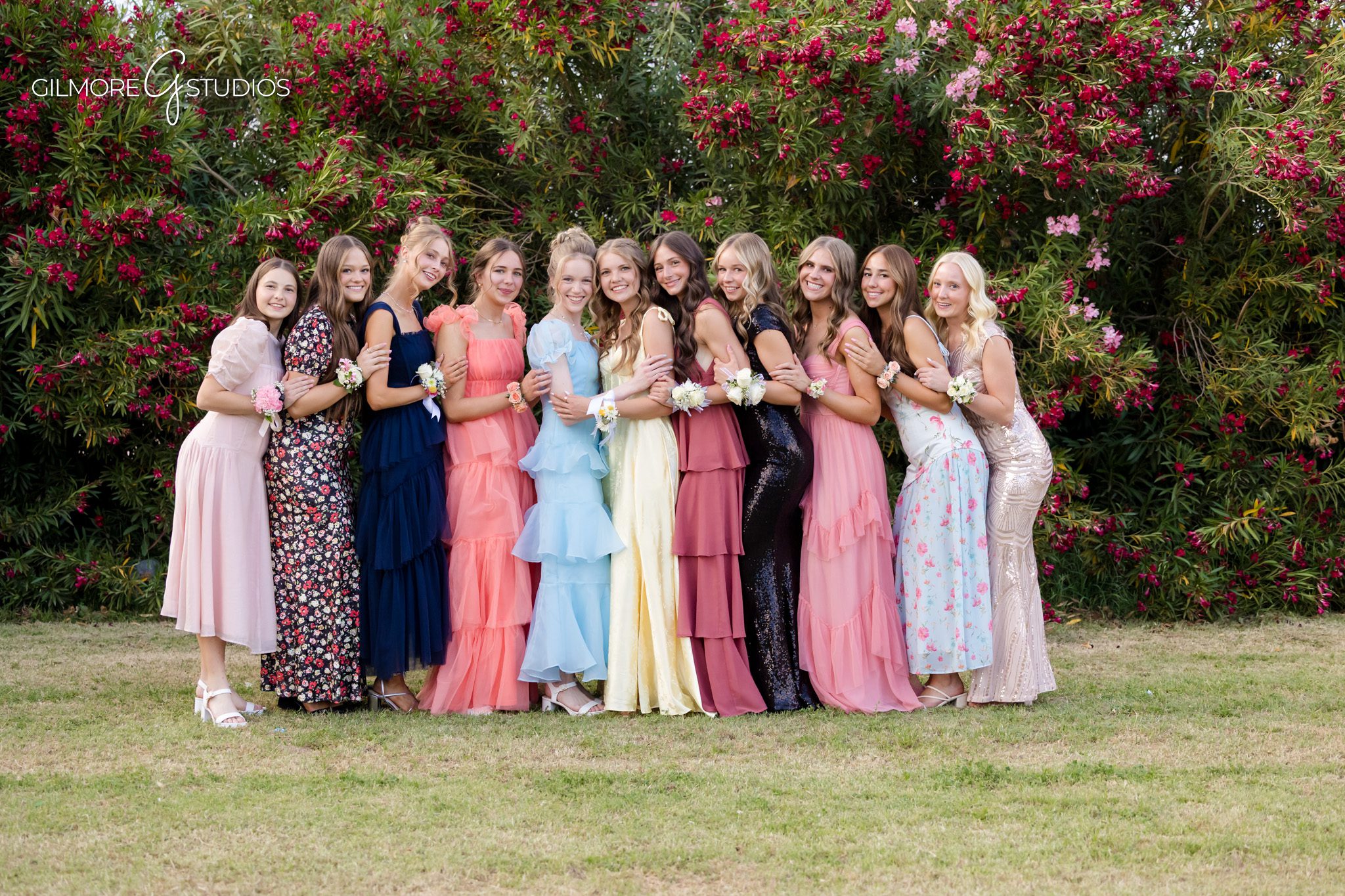 Gilbert prom photographer capturing formal couple portraits
ALA prom group posing in garden setting in Gilbert AZ